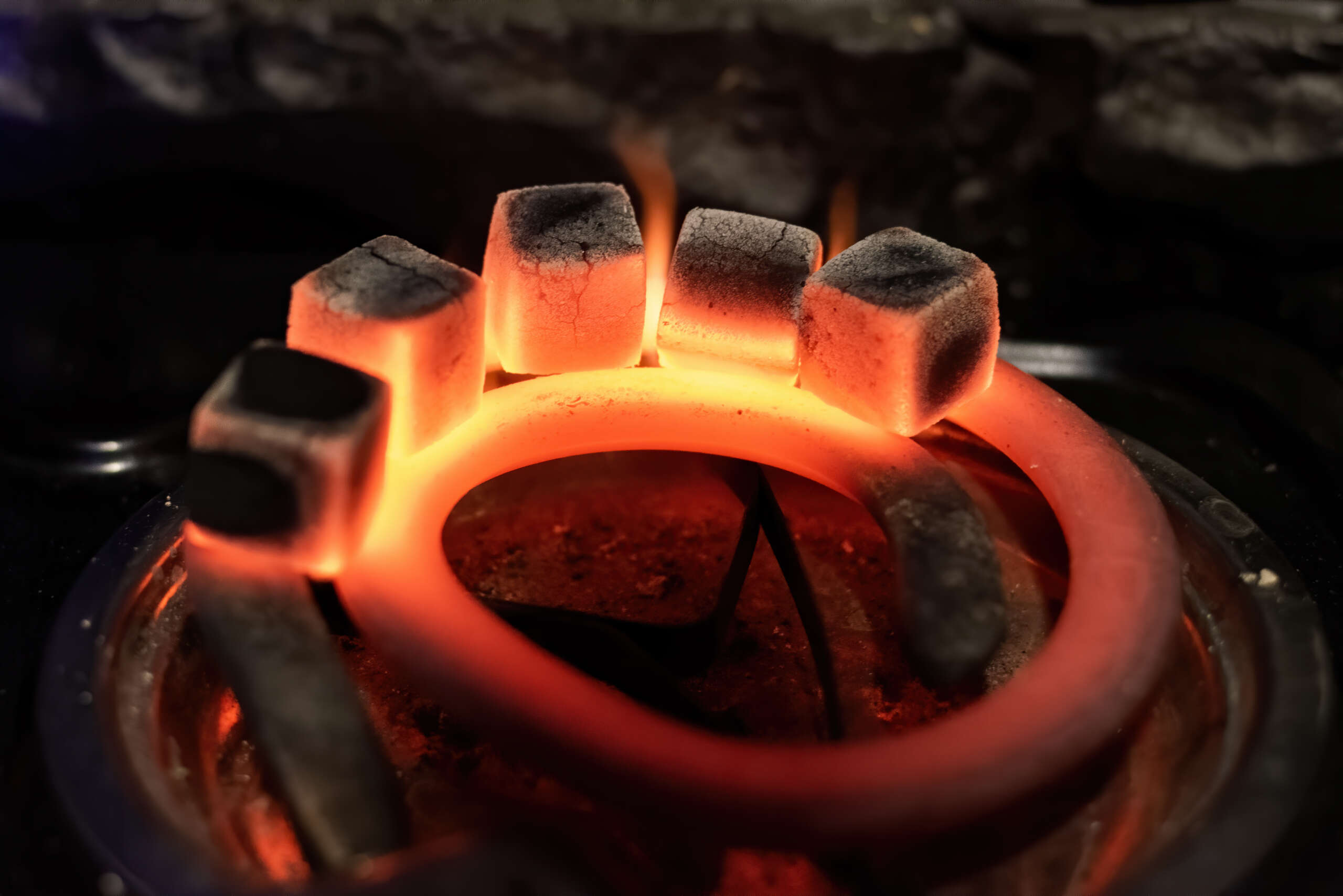 Five coals for hookah heating on the stove
